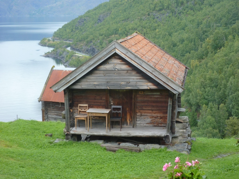 View of house and fjord behind