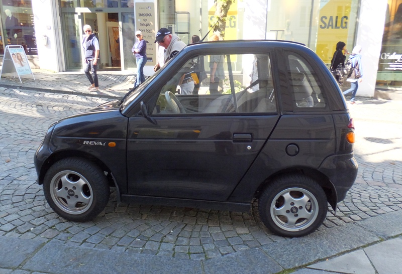 Tiny black Reva car