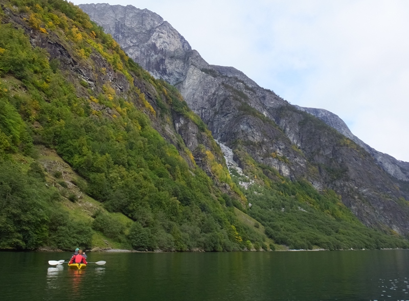 Kayak, mountain, and clouds