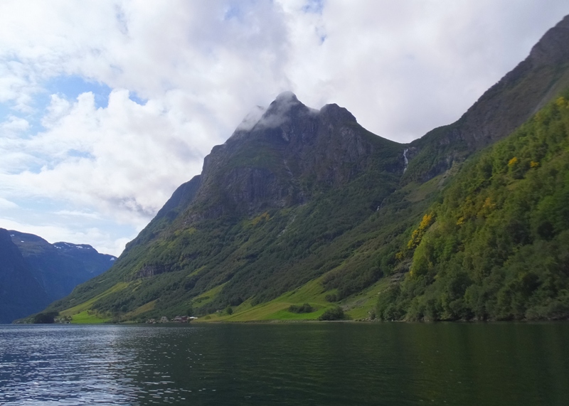 Clouds, mountain, and water