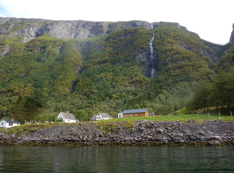 Waterfall and small farm