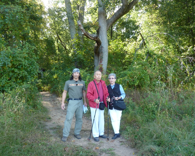 My folks and I with Dad holding hiking poles