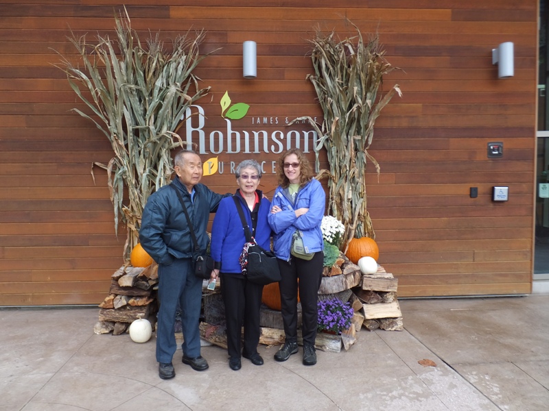 My parents and Norma in front of the Robinson Nature Center building