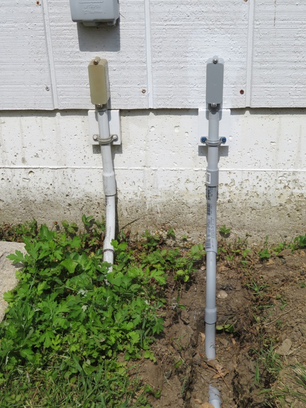 Conduit connection to west side of garage