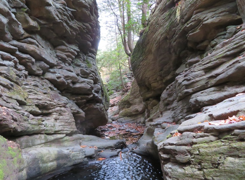 Water surrounded by steep rocks