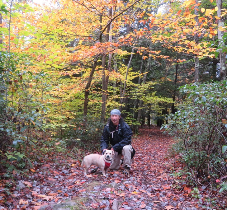 Daphne and me on leaf-covered trail