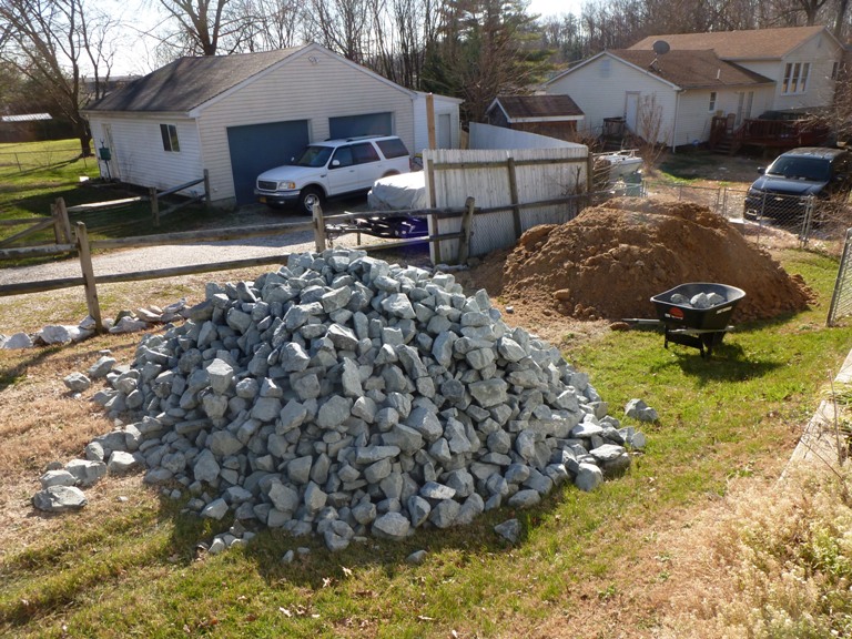 Dirt and rip rap in my neighbor's driveway which they let me use