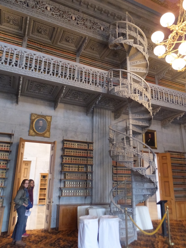 Norma and Carmen near spiral staircase