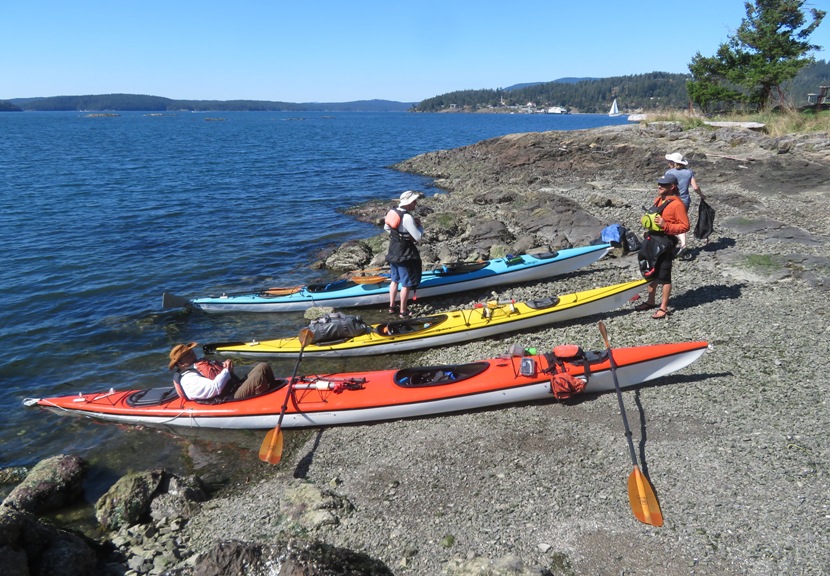 Kayaks on rocky beach at Blind Island