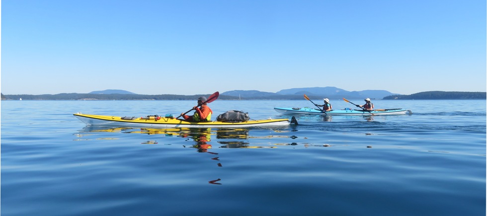 Noah, Chris, and Dorota on the water