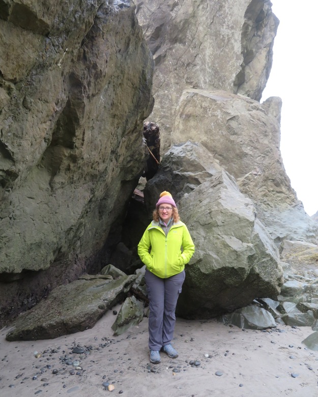 Norma standing in front of giant boulders