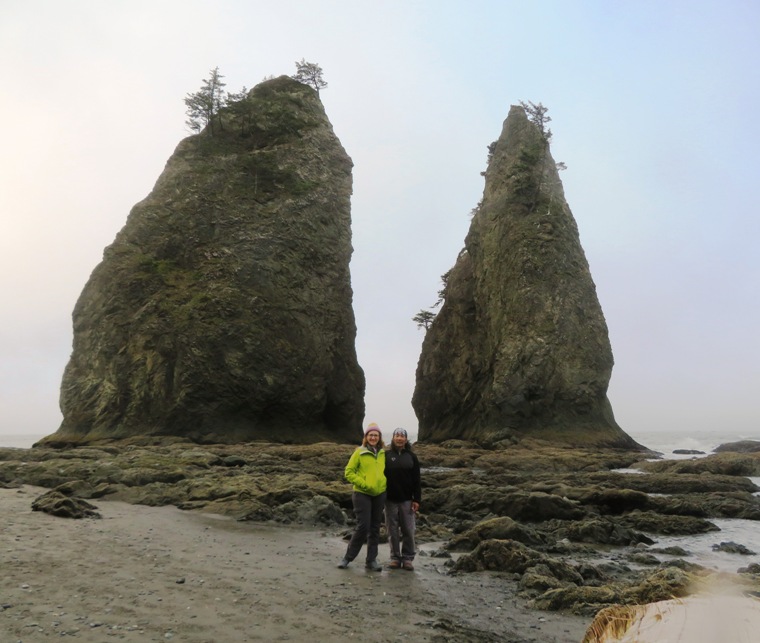 Norma and I in front of two vertical stone structures