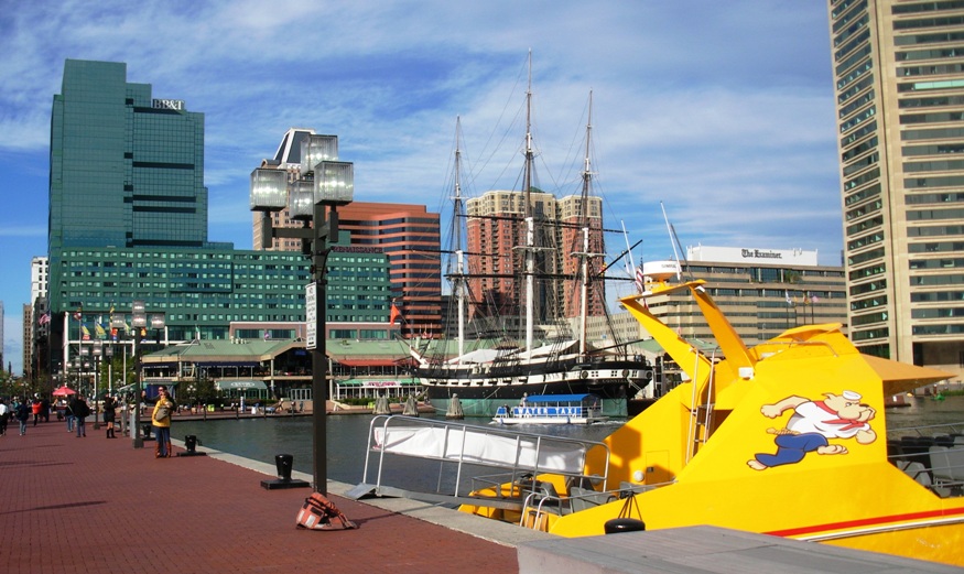 A view of the Inner Harbor and a yellow Seadog speedboat