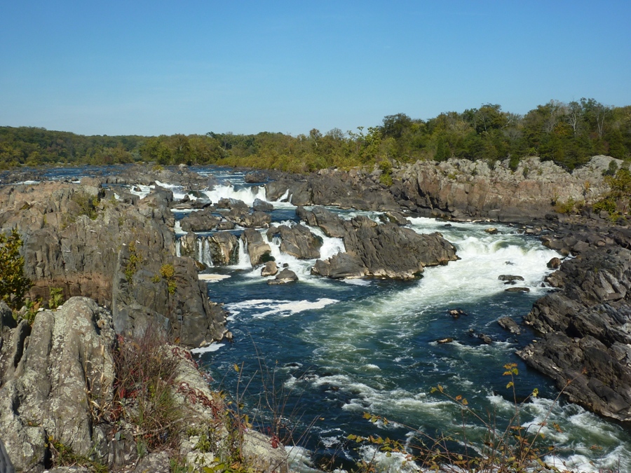 A whitewater view of the rocky Great Falls