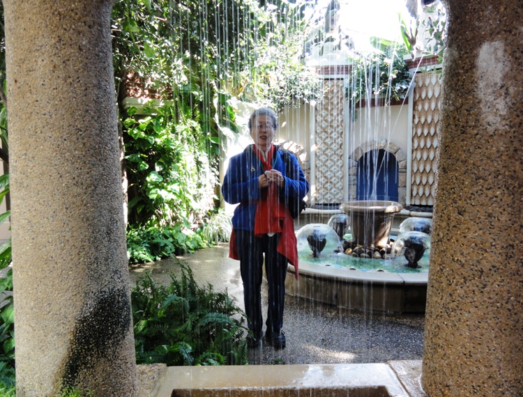 Mom behind falling water