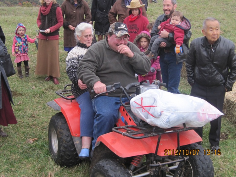 Scott ready to drive off with Hazel behind him on his ATV