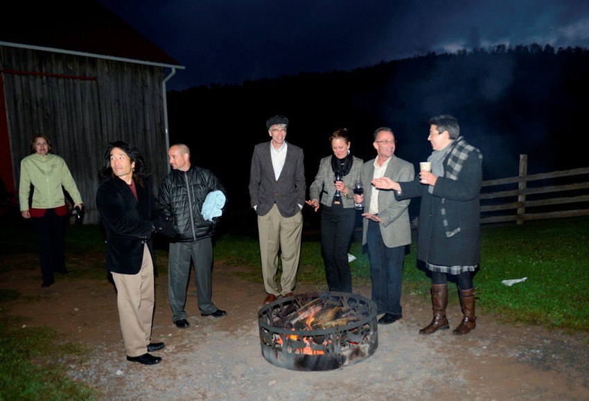 Group gathered around bonfire