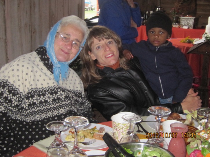 Hazel, Joyce, and Laquan prepare to dig in