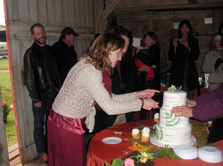 Norma cutting the cake