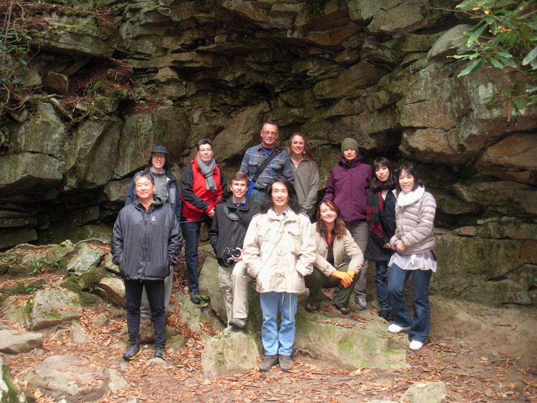 Group photo in front of rocks