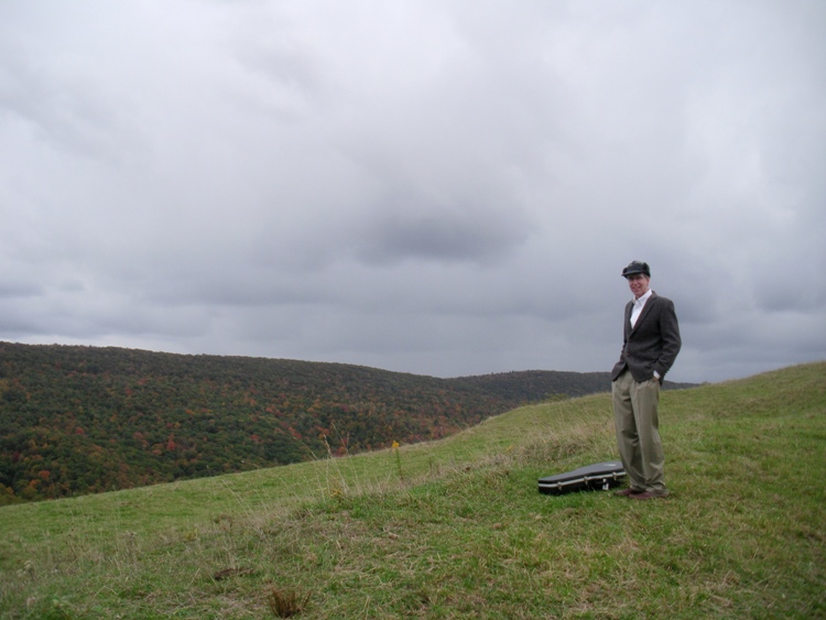 Clark standing in an open field