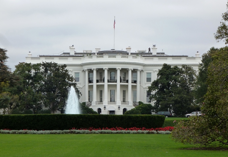 White House with man standing on top