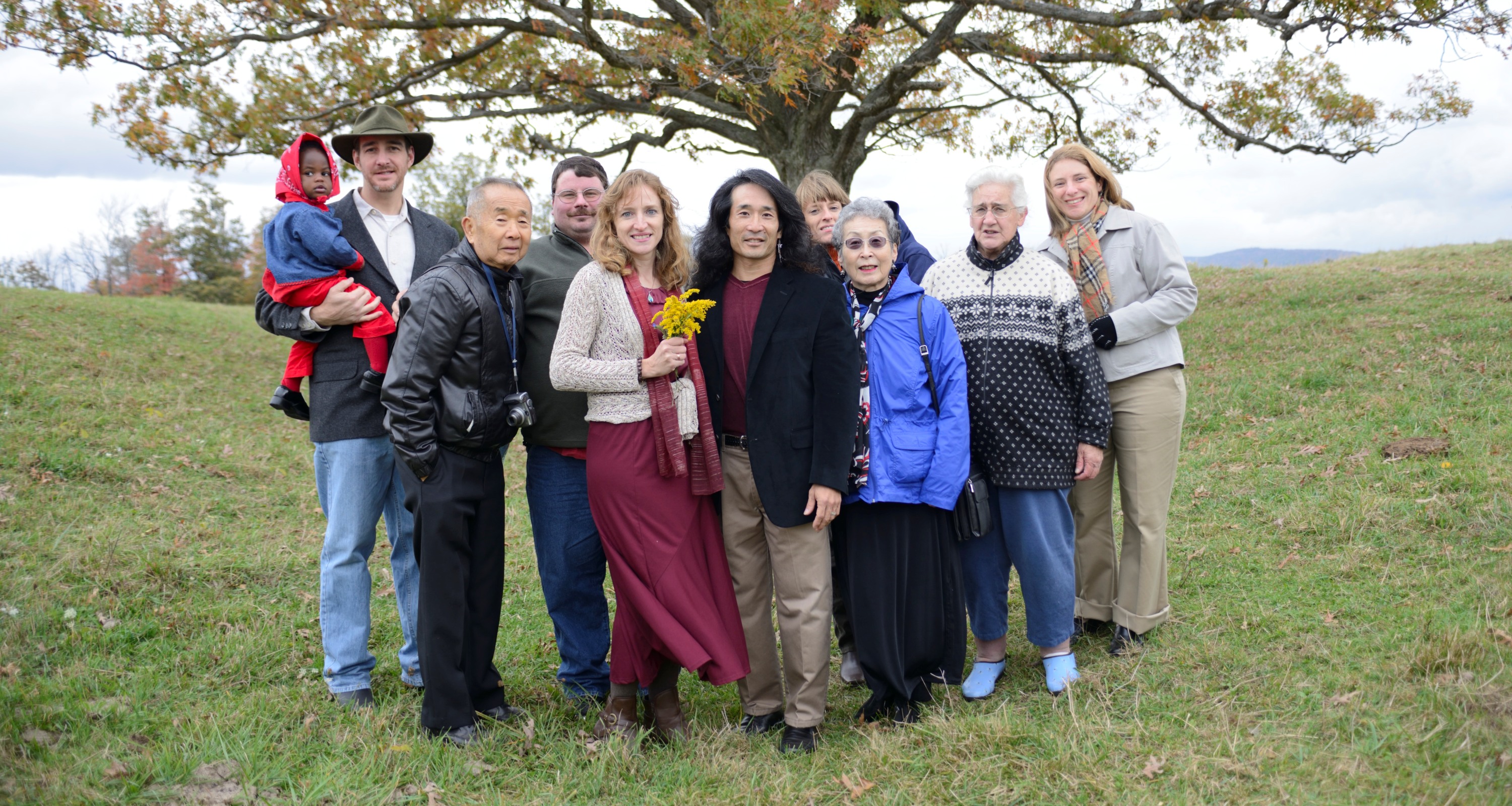 Norma's family and my family at the oak tree on the farm where she grew up