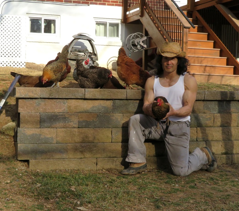 My holding Gilda by the retaining wall