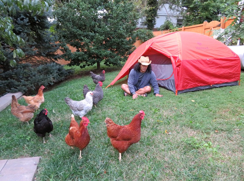 The girls watching me set up a tent