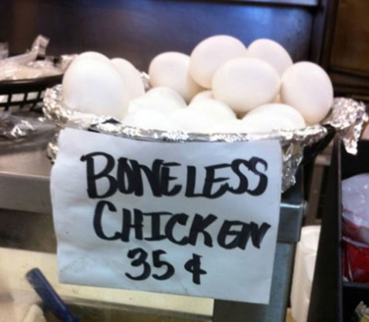 Eggs in bowl with sign that reads \