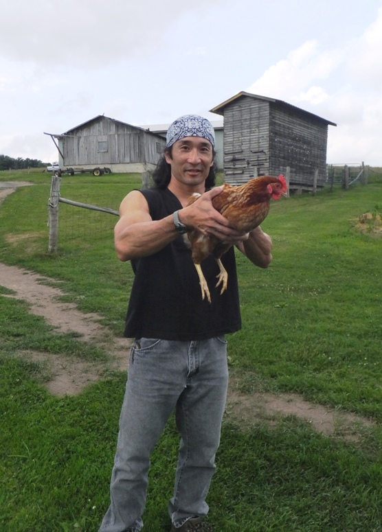 Me holding Rhode Island Red