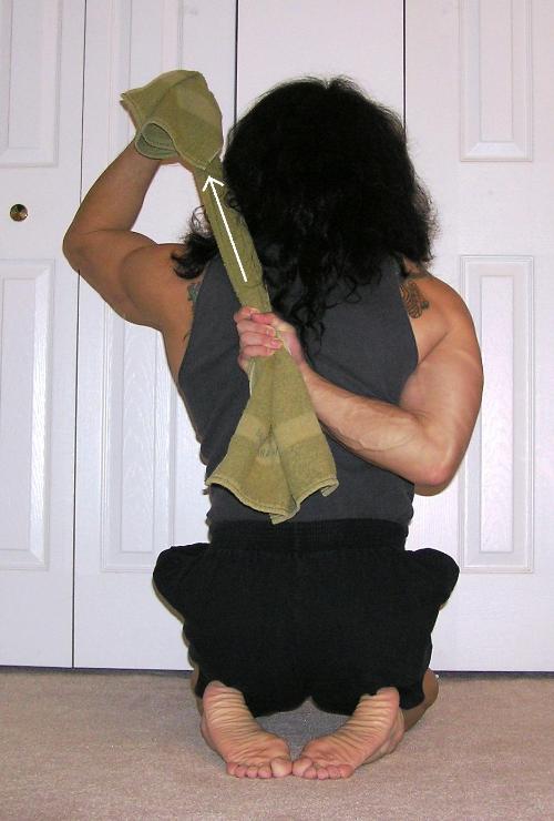 Upward shoulder stretch with towel