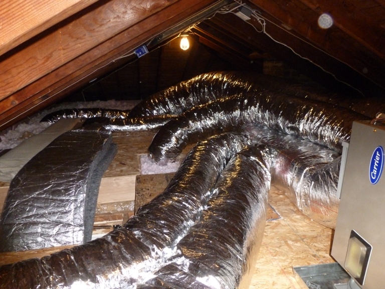 HVAC air handler and ducts in attic