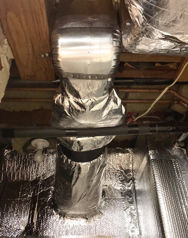 Duct work in boiler room going to basement bedroom on the northeast side