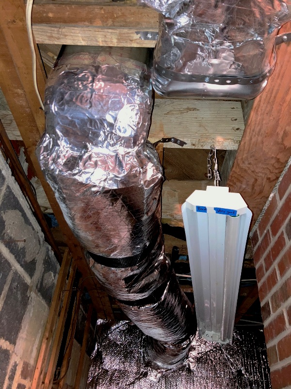 Duct work in boiler room going to what would become the entertainment room on the south side