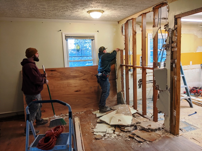 Removing the wall between the kitchen and the living room; looking west