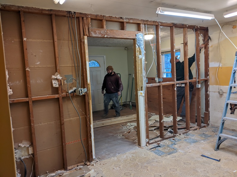 Removing the wall between the kitchen and the living room; looking east