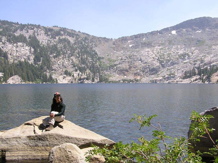 Me sitting by a lake