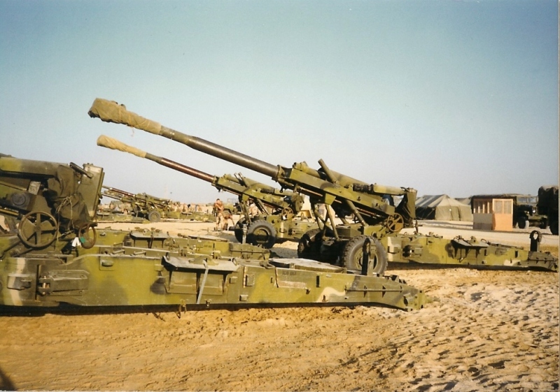 Green camouflaged artillery