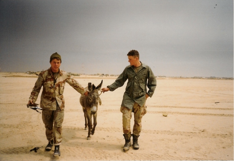 Shim and Wood guiding a donkey