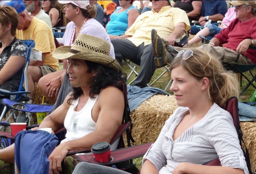 Jessica and I sitting with hay bales behind