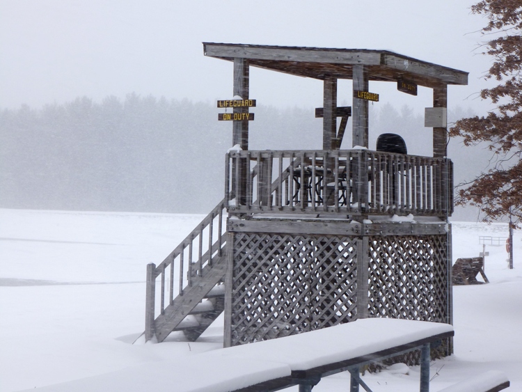 Snow-covered lifeguard station