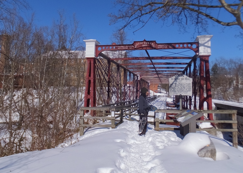 Snow-covered Bollman Truss Bridge