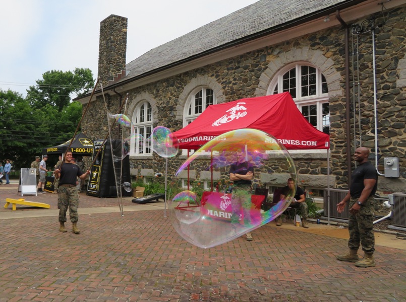 Marine standing next to bubble