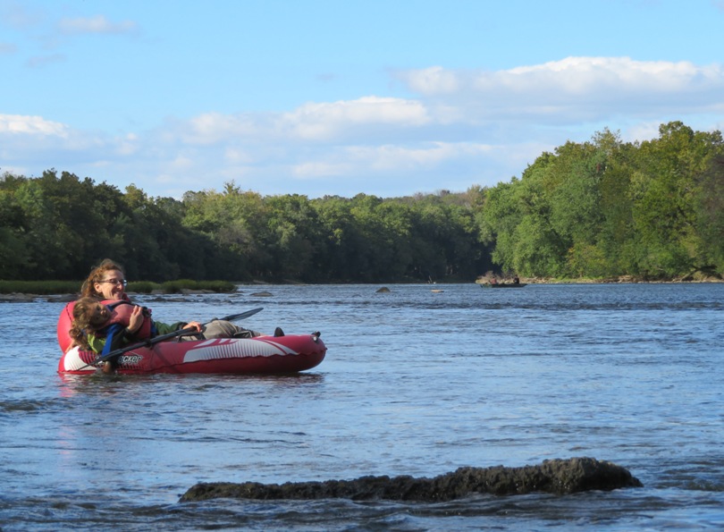 Norma with kid on her tube