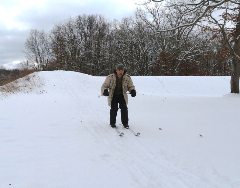 Me skiing down small hill