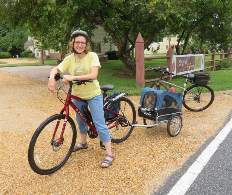 Norma with bicycle and Daphne in dog trailer