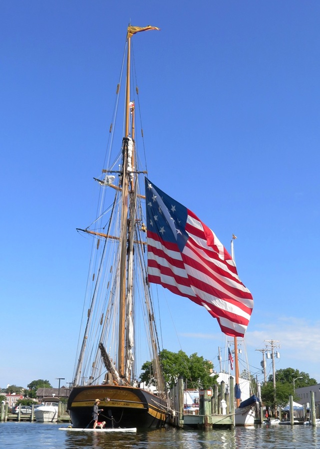 Daphne and I paddle near the Pride of Baltimore II