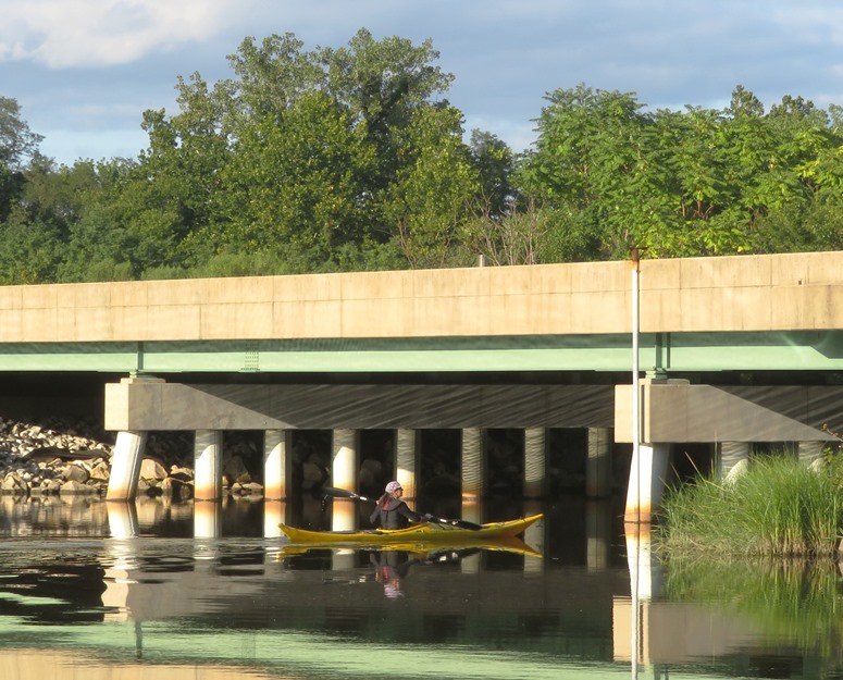 Sara kayaking under Arundel Expressway (route 10)