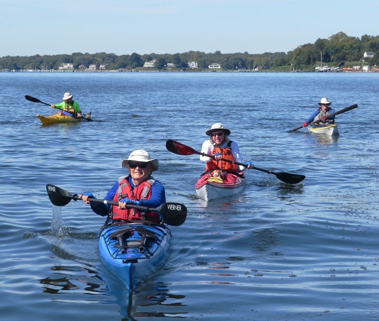 John S. leading other kayakers